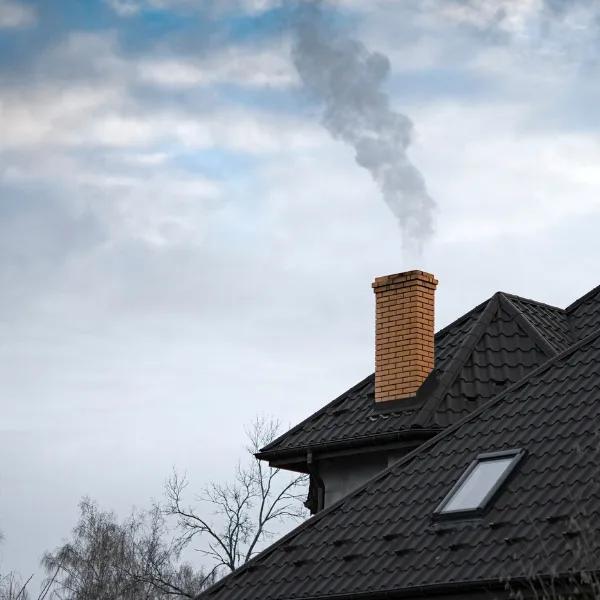 House chimney and roof prepared for chimney sweeping