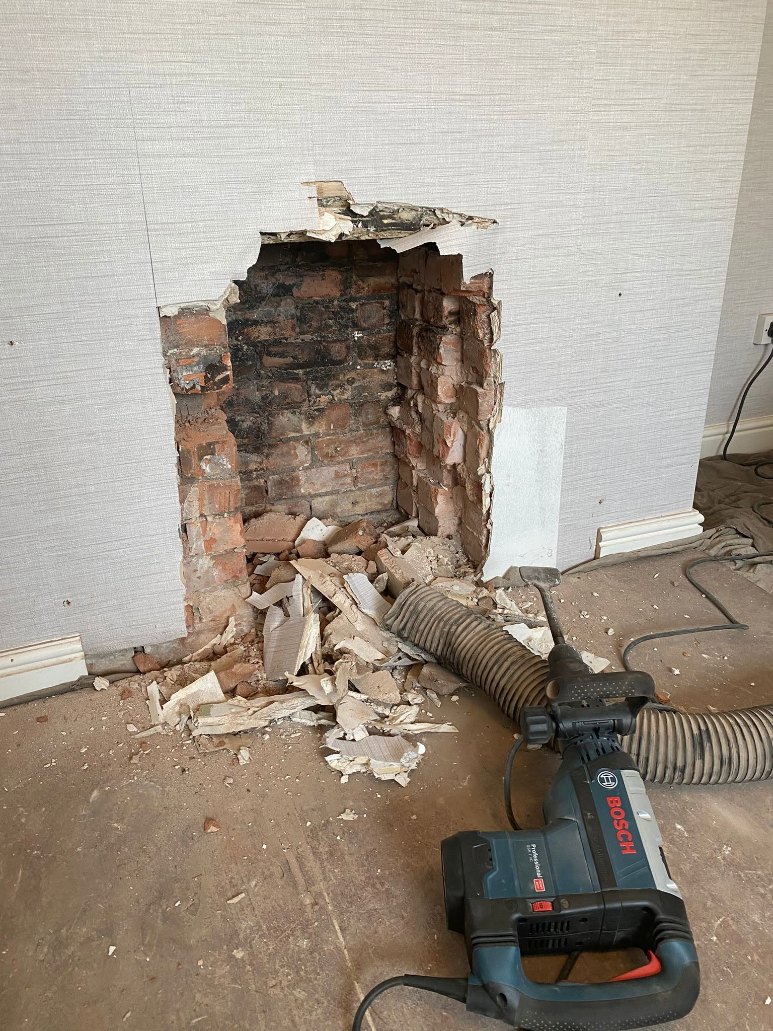 Fireplace before wood burning stove installation in Stafford
