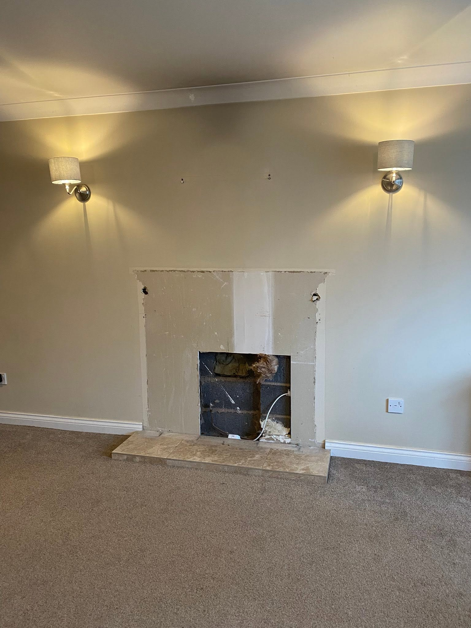 Fireplace before wood burning stove installation in Stone